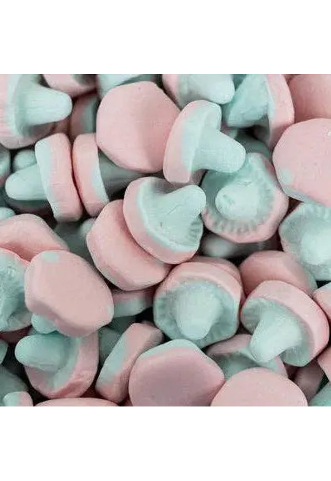 Pink and blue mushroom-shaped candies piled together.