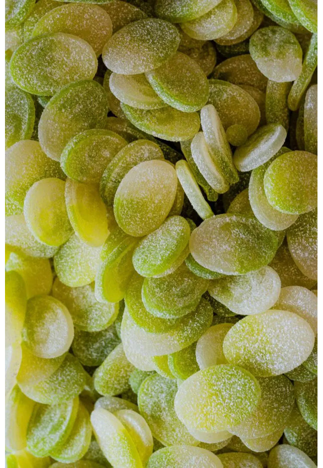 Close-up of sliced green kiwifruit pieces.