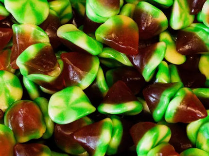 Close-up of green and brown gummy candies.