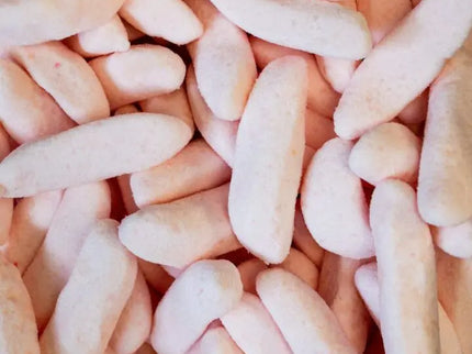 Close-up of pink foam packing peanuts for cushioning.