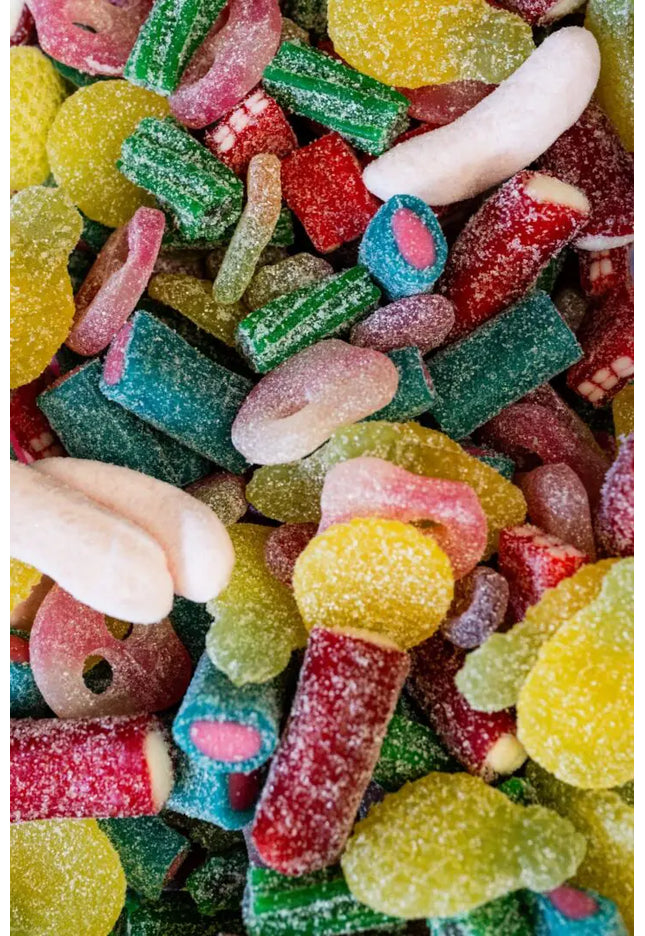 Colorful assorted gummy candies in various shapes and flavors.
