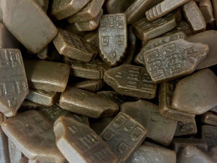Licorice candies shaped like small buildings.