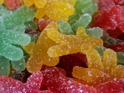 Colorful gummy candies covered in sugar.